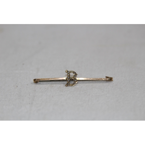 1192 - 9CT GOLD PIN WITH STEEL PIN - 1.28G