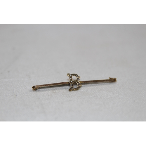 1192 - 9CT GOLD PIN WITH STEEL PIN - 1.28G