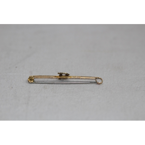 1192 - 9CT GOLD PIN WITH STEEL PIN - 1.28G