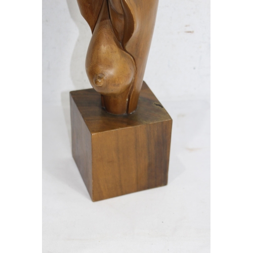 1037 - ABSTRACT WOODEN FIGURE OF A LADY
54CM