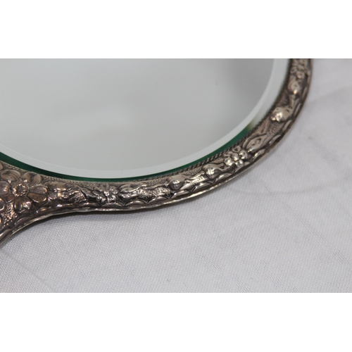 1091 - LARGE SILVER HAND MIRROR WITH BEAUTIFUL FLORAL EMBOSSED DECORATION WITH A LARGE VARIETY OF FLOWERS B... 