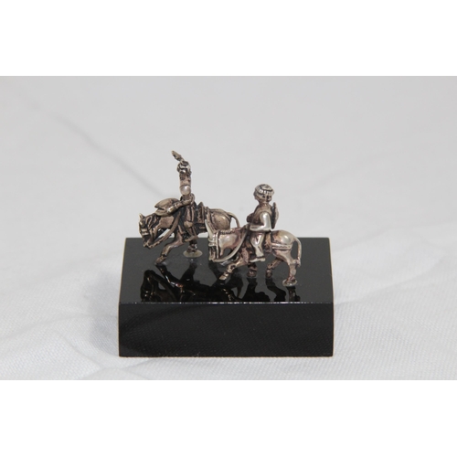 1092 - SOUTH AMERICAN SILVER SMALL SCULPTURE OF TWO PEOPLE RIDING ON DONKEY'S
5 X 5CM