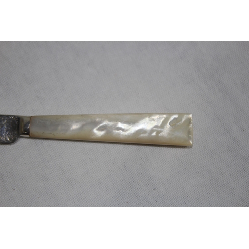 1096 - SILVER BLADED AND TINED KNIFE AND FORK WITH MOTHER OF PEARL HANDLE - GROSS WEIGHT 91.2G - M H AND CO... 