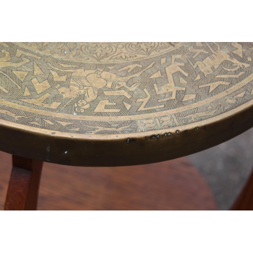 4 - BRASS TOPPED OCCASIONAL TABLE
55 X 67CM