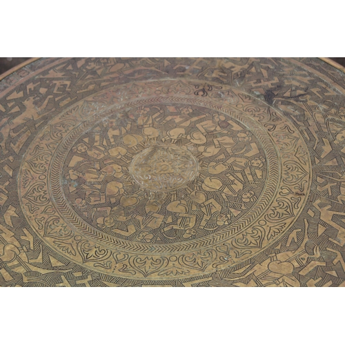 4 - BRASS TOPPED OCCASIONAL TABLE
55 X 67CM