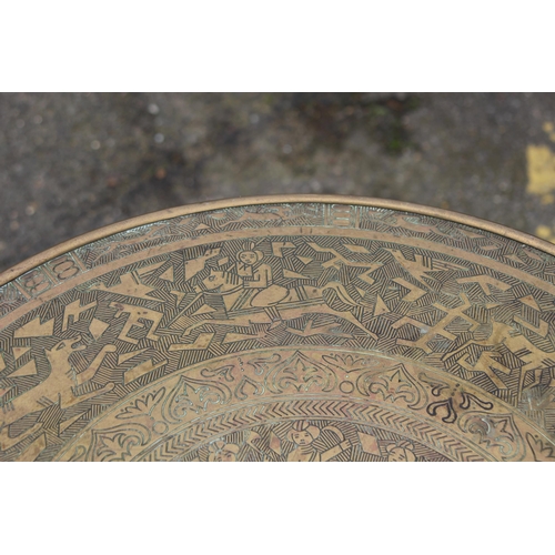 4 - BRASS TOPPED OCCASIONAL TABLE
55 X 67CM