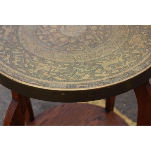 4 - BRASS TOPPED OCCASIONAL TABLE
55 X 67CM