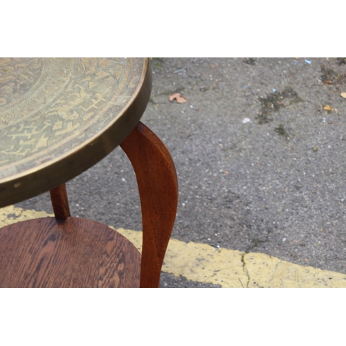 4 - BRASS TOPPED OCCASIONAL TABLE
55 X 67CM