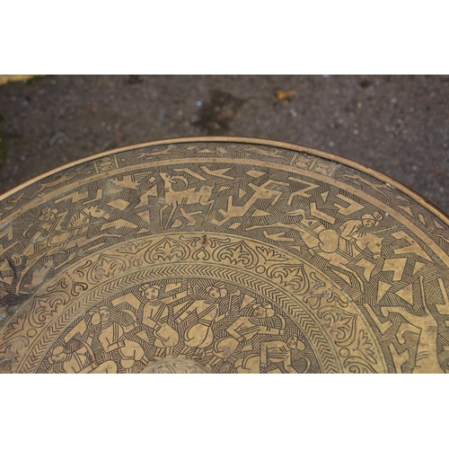 4 - BRASS TOPPED OCCASIONAL TABLE
55 X 67CM