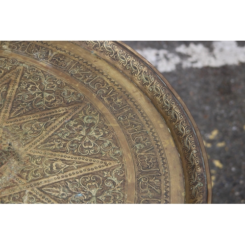 6 - VINTAGE ETHNIC BRASS TOPPED TABLE 
70 X 58CM