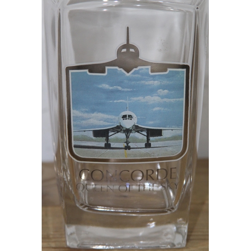 329 - COMMEMMERATIVE CONCORDE DECANTER AND GLASSES
26CM