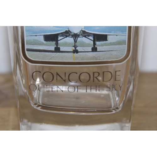 329 - COMMEMMERATIVE CONCORDE DECANTER AND GLASSES
26CM