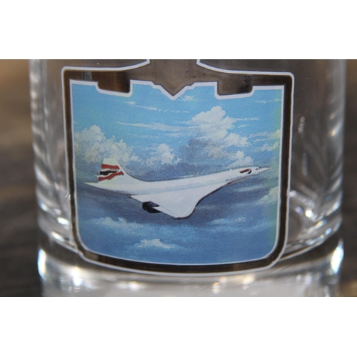 329 - COMMEMMERATIVE CONCORDE DECANTER AND GLASSES
26CM