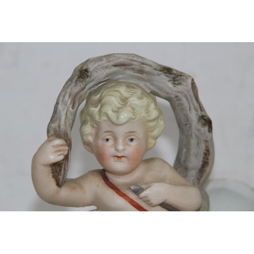 340 - PAIR OF BISQUE POSY HOLDERS DEPICTING CHERUBS
17 X 15CM