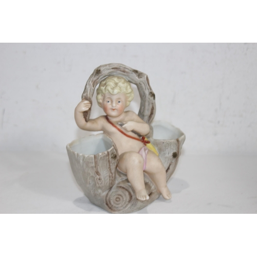 340 - PAIR OF BISQUE POSY HOLDERS DEPICTING CHERUBS
17 X 15CM