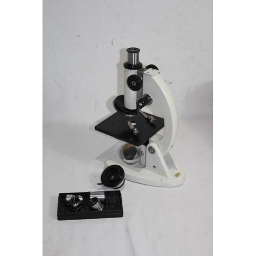 512 - BOXED MICROSCOPE AND LENSES