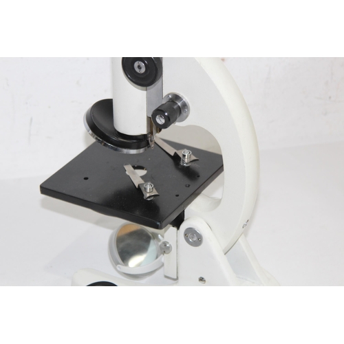 512 - BOXED MICROSCOPE AND LENSES