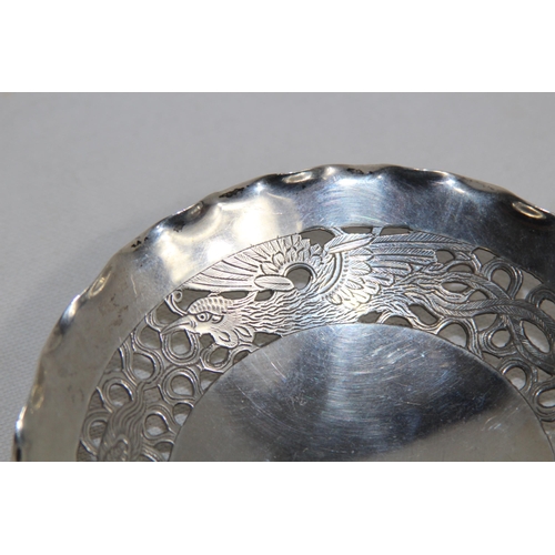 1143 - CHINESE EXPORT STERLING SILVER PIERCED BOWL DECORATED WITH A DRAGON AND PHOENIX