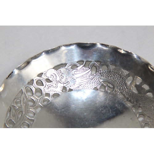 1143 - CHINESE EXPORT STERLING SILVER PIERCED BOWL DECORATED WITH A DRAGON AND PHOENIX