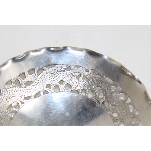 1143 - CHINESE EXPORT STERLING SILVER PIERCED BOWL DECORATED WITH A DRAGON AND PHOENIX