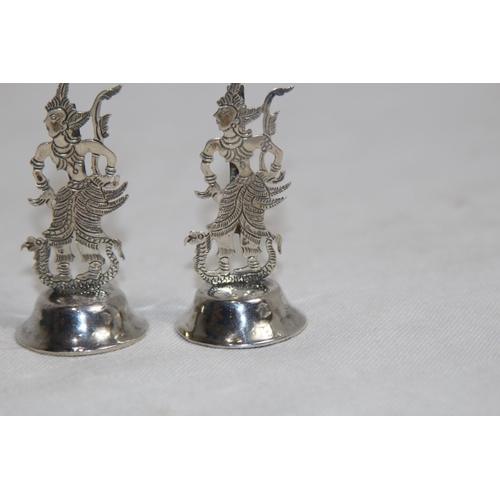 1145 - PAIR OF EASTERN SILVER NAME PLACE OR MENU HOLDERS IN FORM OF DANCING FIGURES