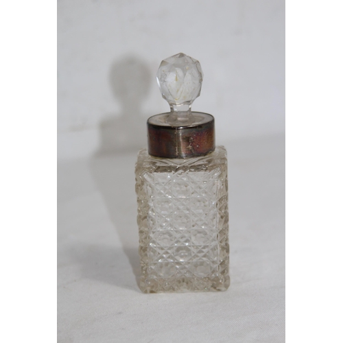 1148 - SILVER COLLARED CUT GLASS SCENT BOTTLE 
13CM