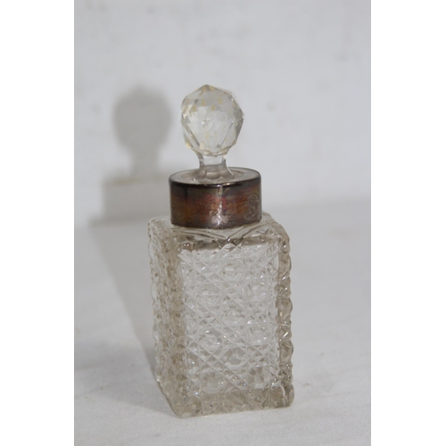 1148 - SILVER COLLARED CUT GLASS SCENT BOTTLE 
13CM