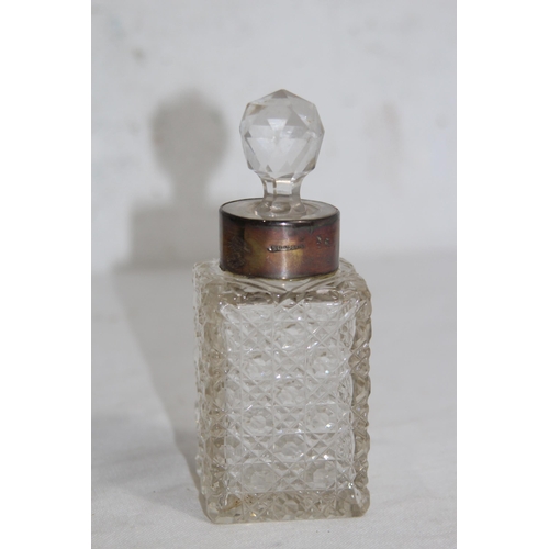 1148 - SILVER COLLARED CUT GLASS SCENT BOTTLE 
13CM