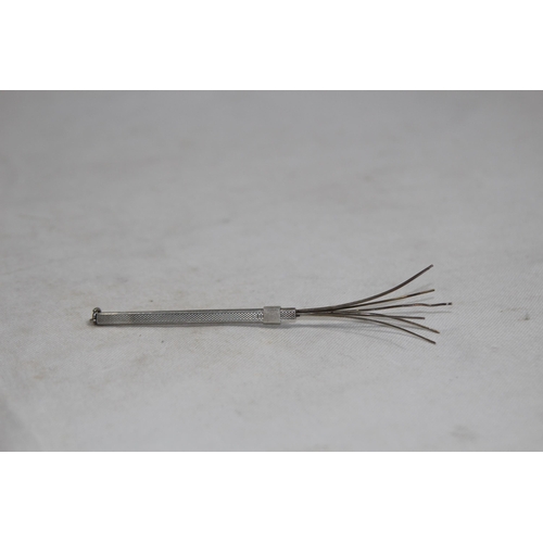 1151 - CHAMPAGNE SILVER SWIVAL STICK OF SQUARE FORM WITH ENGINE TURNED FINISH BY SJR LONDON