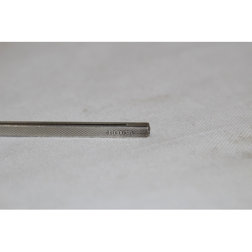 1151 - CHAMPAGNE SILVER SWIVAL STICK OF SQUARE FORM WITH ENGINE TURNED FINISH BY SJR LONDON