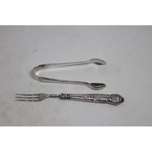 1155 - WILLIAM IV SILVER TINED AND HANDLE FORK BY AARON HADFIELD SHEFFIELD 1833 AND A PAIR OF SILVER SUGAR ... 