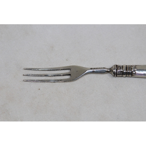 1155 - WILLIAM IV SILVER TINED AND HANDLE FORK BY AARON HADFIELD SHEFFIELD 1833 AND A PAIR OF SILVER SUGAR ... 