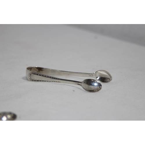 1155 - WILLIAM IV SILVER TINED AND HANDLE FORK BY AARON HADFIELD SHEFFIELD 1833 AND A PAIR OF SILVER SUGAR ... 