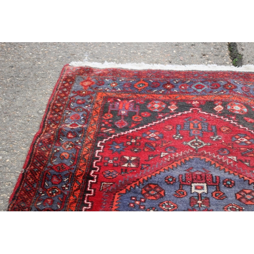 265 - VINTAGE MIDDLE EASTERN RUG
247 X 144CM