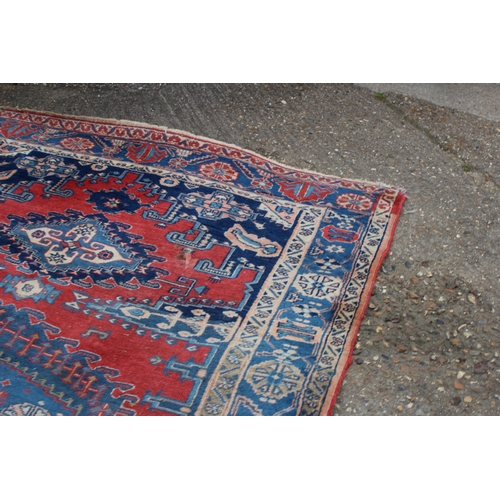 277 - LARGE WOOL RUG
305 X 105CM