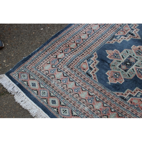 279 - LARGE HAND KNOTTED WOOL RUG
274 X 187CM