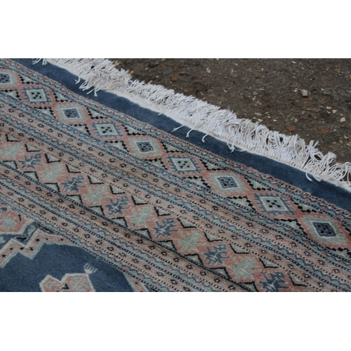 279 - LARGE HAND KNOTTED WOOL RUG
274 X 187CM