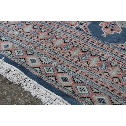 279 - LARGE HAND KNOTTED WOOL RUG
274 X 187CM