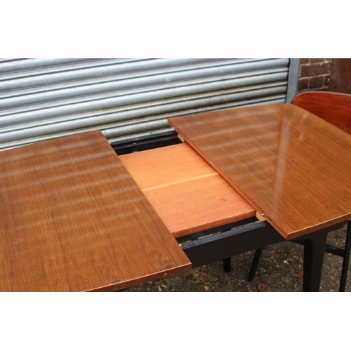 54 - G PLAN E GOMME EXTENDING TABLE AND 4 CHAIRS  
105 X 76 X 75CM