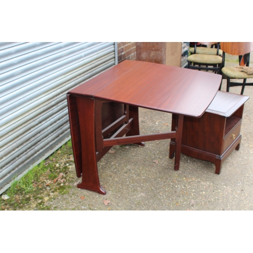 56 - PAIR OF STAG MINSTREL BEDSIDE TABLES AND A TABLE 
150 X 90 X 76CM