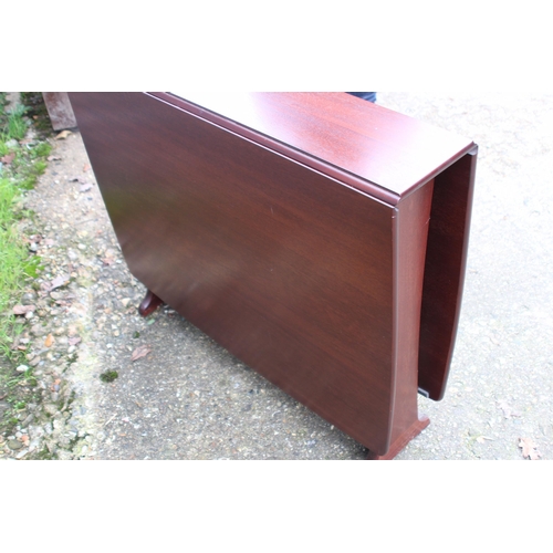 56 - PAIR OF STAG MINSTREL BEDSIDE TABLES AND A TABLE 
150 X 90 X 76CM