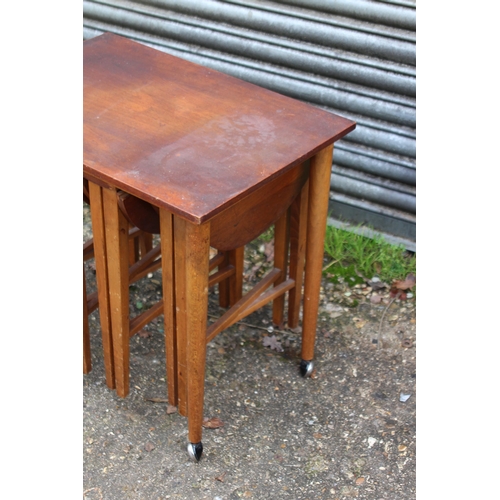 67 - POUL HUNDEVAD NEST OF TABLES AND A DANISH NEST OF TABLES 
53 X 38 X 54CM