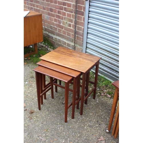 67 - POUL HUNDEVAD NEST OF TABLES AND A DANISH NEST OF TABLES 
53 X 38 X 54CM