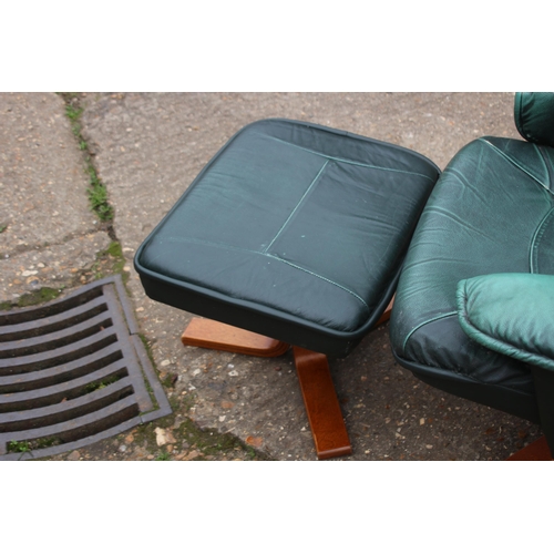 81 - LEATHER ARMCHAIR AND STOOL
60 X 80 X 96CM