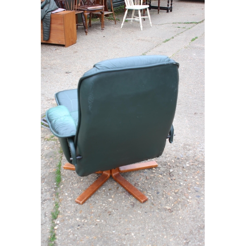 81 - LEATHER ARMCHAIR AND STOOL
60 X 80 X 96CM