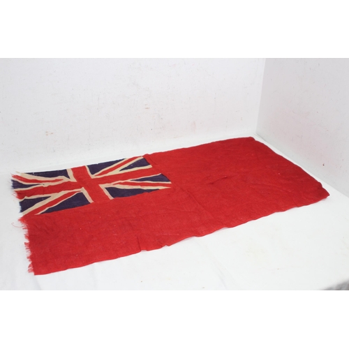 902 - EARLY 20TH CENTURY RED ENSIGN FLAG SHOWING SIGNS OF WEAR AND AGE 
86 X 46CM