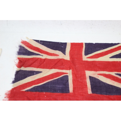 902 - EARLY 20TH CENTURY RED ENSIGN FLAG SHOWING SIGNS OF WEAR AND AGE 
86 X 46CM