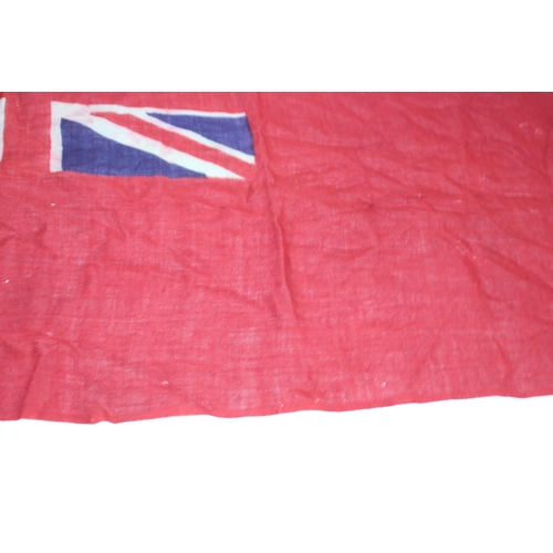 902 - EARLY 20TH CENTURY RED ENSIGN FLAG SHOWING SIGNS OF WEAR AND AGE 
86 X 46CM