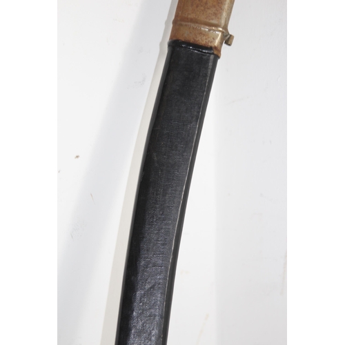 909 - INDIAN FORGED CURVED SWORD IN SCABBARD WITH ETCHED BLADE