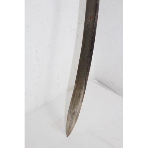 909 - INDIAN FORGED CURVED SWORD IN SCABBARD WITH ETCHED BLADE